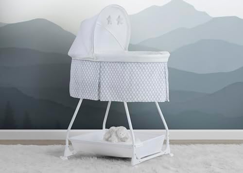 Delta Children Deluxe Soothing Dreams Bassinet with Nightlight and Music