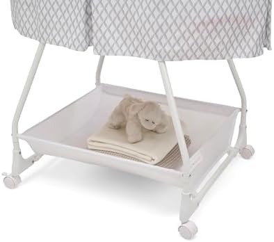 Delta Children Deluxe Soothing Dreams Bassinet with Nightlight and Music