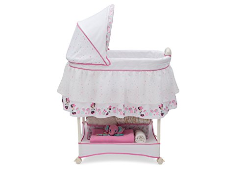 Delta Children Gliding Bedside Bassinet with Disney Minnie Mouse Design 1