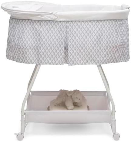 Delta Children Deluxe Soothing Dreams Bassinet with Nightlight and Music